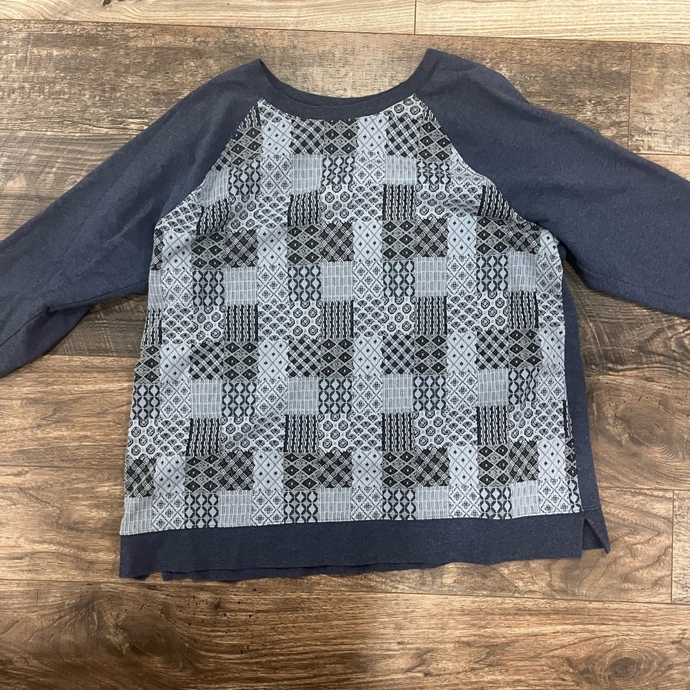 Thrifted blue sweatshirt! Super cool patterns on the front!